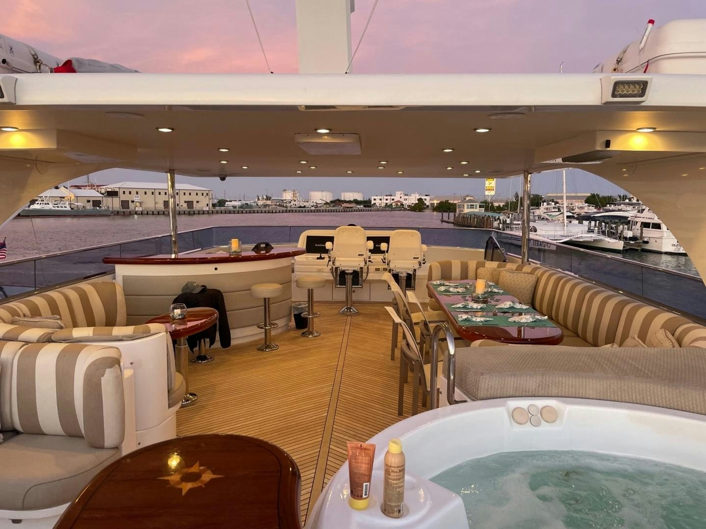 a room with a table and chairs aboard WARHORSE Yacht for Sale