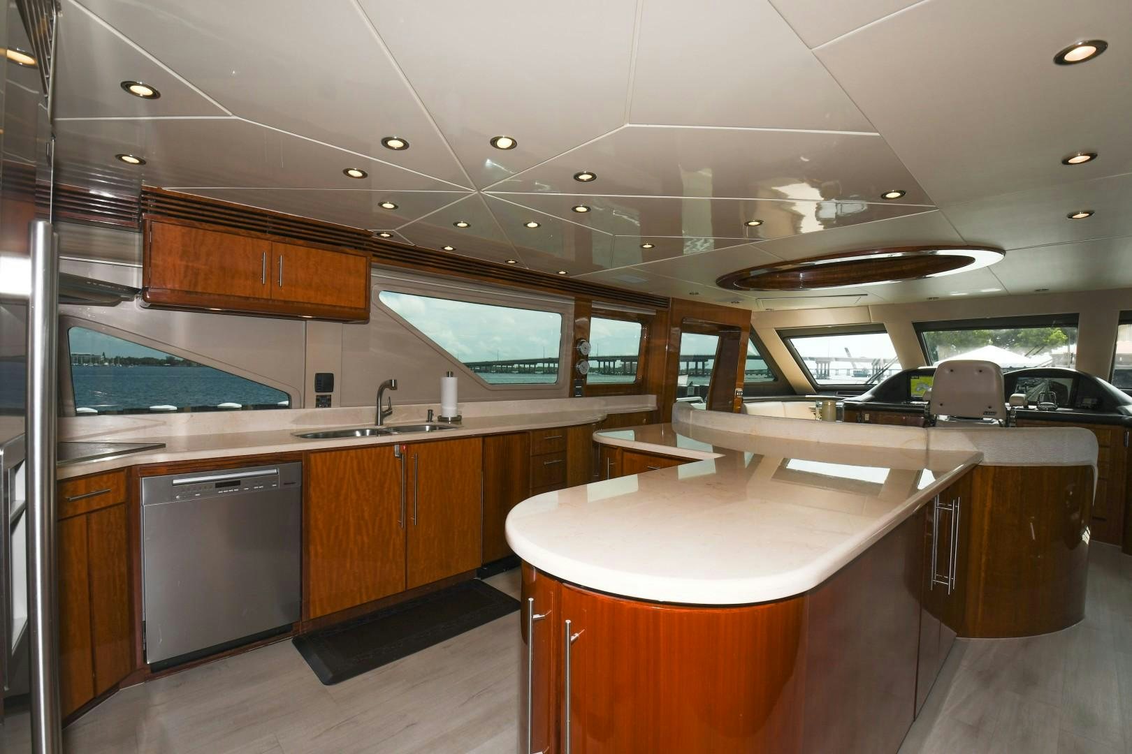 a large kitchen with a large island aboard WARHORSE Yacht for Sale