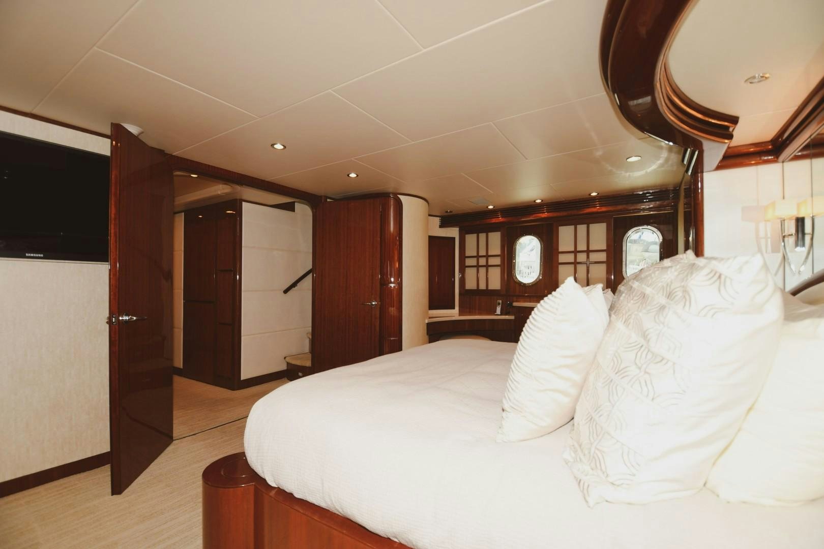 a bed in a room aboard WARHORSE Yacht for Sale