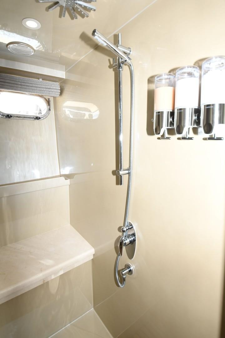 a shower with a glass door aboard WARHORSE Yacht for Sale
