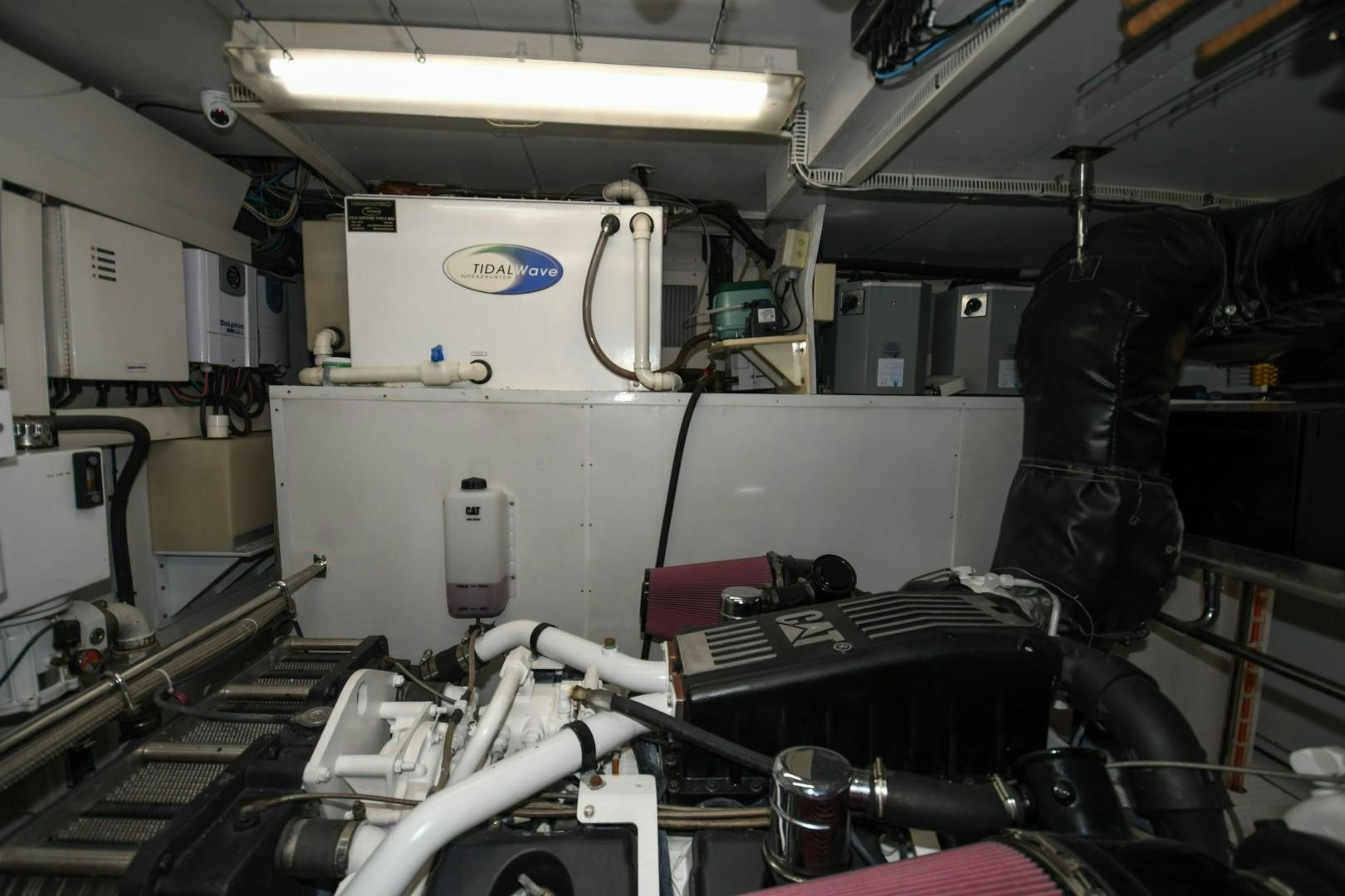 a machine with a black glove aboard WARHORSE Yacht for Sale