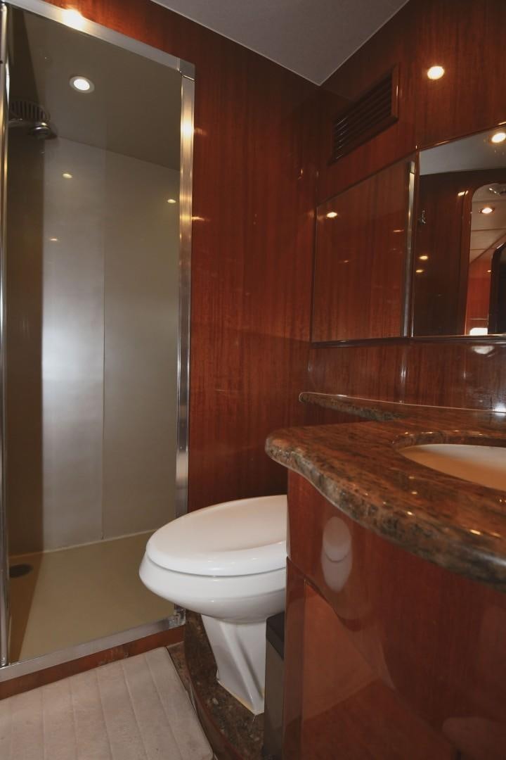 a bathroom with a sink and a toilet aboard WARHORSE Yacht for Sale
