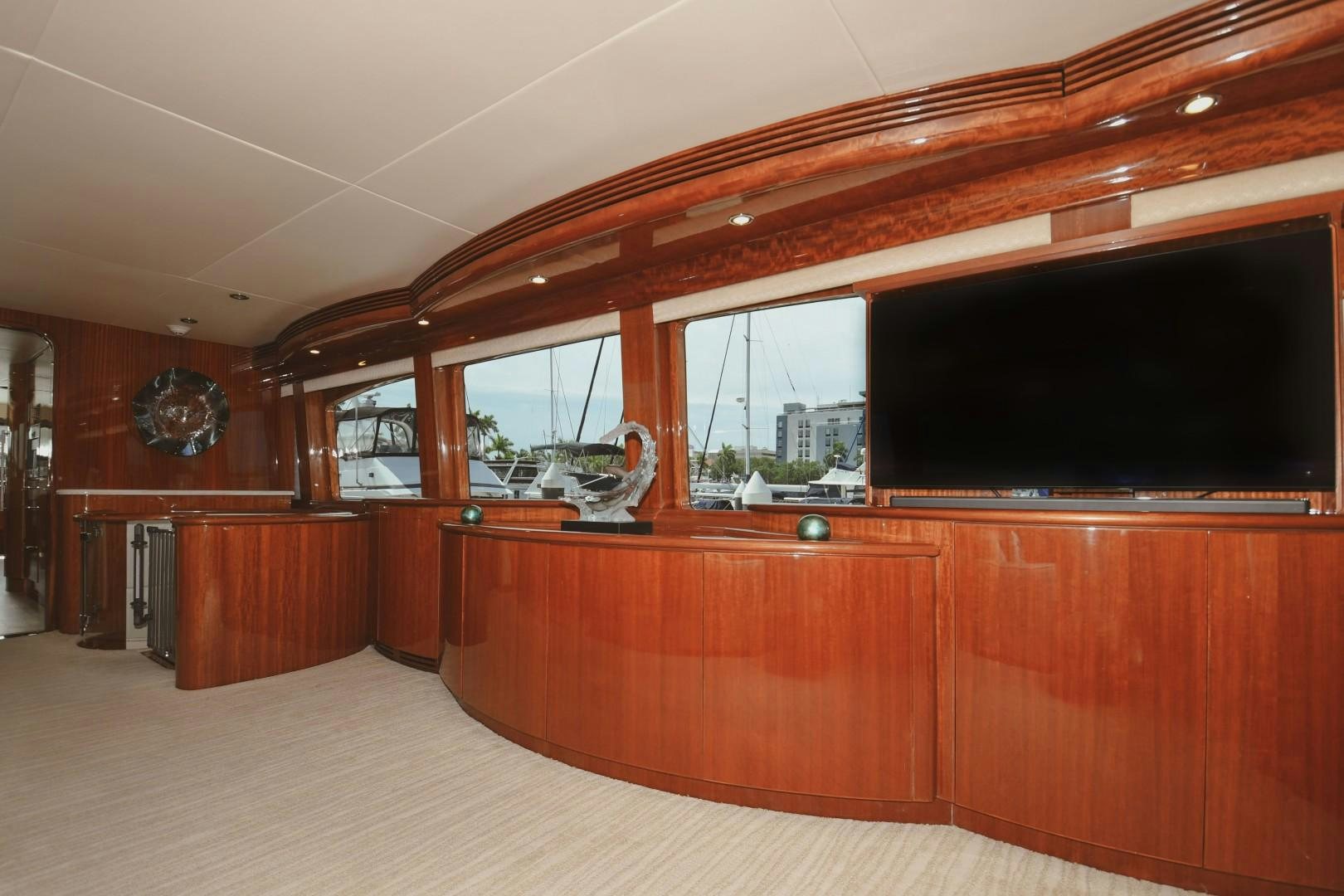 a room with a large tv aboard WARHORSE Yacht for Sale