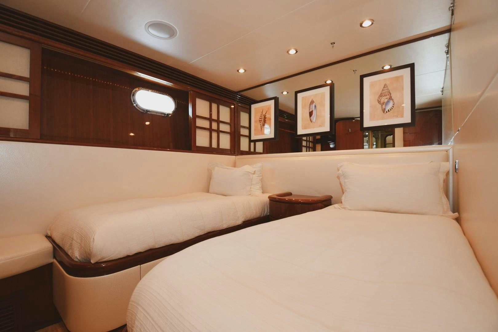 a room with two beds aboard WARHORSE Yacht for Sale