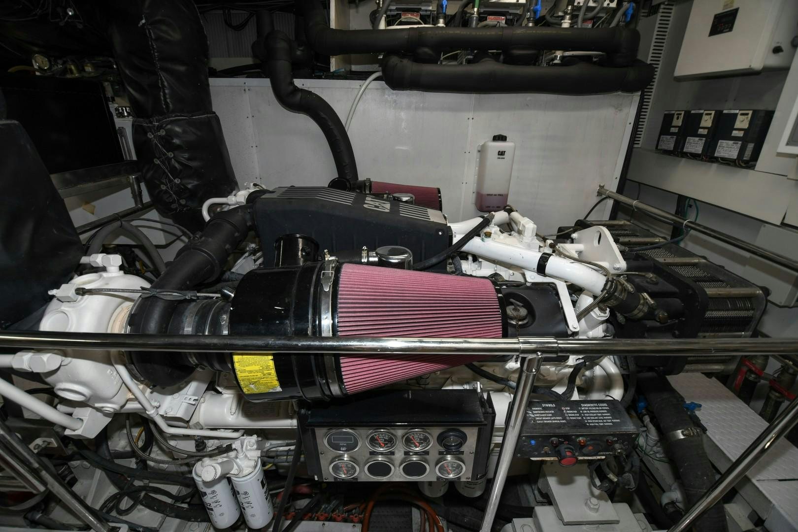 a machine with a pink and black object on the side aboard WARHORSE Yacht for Sale