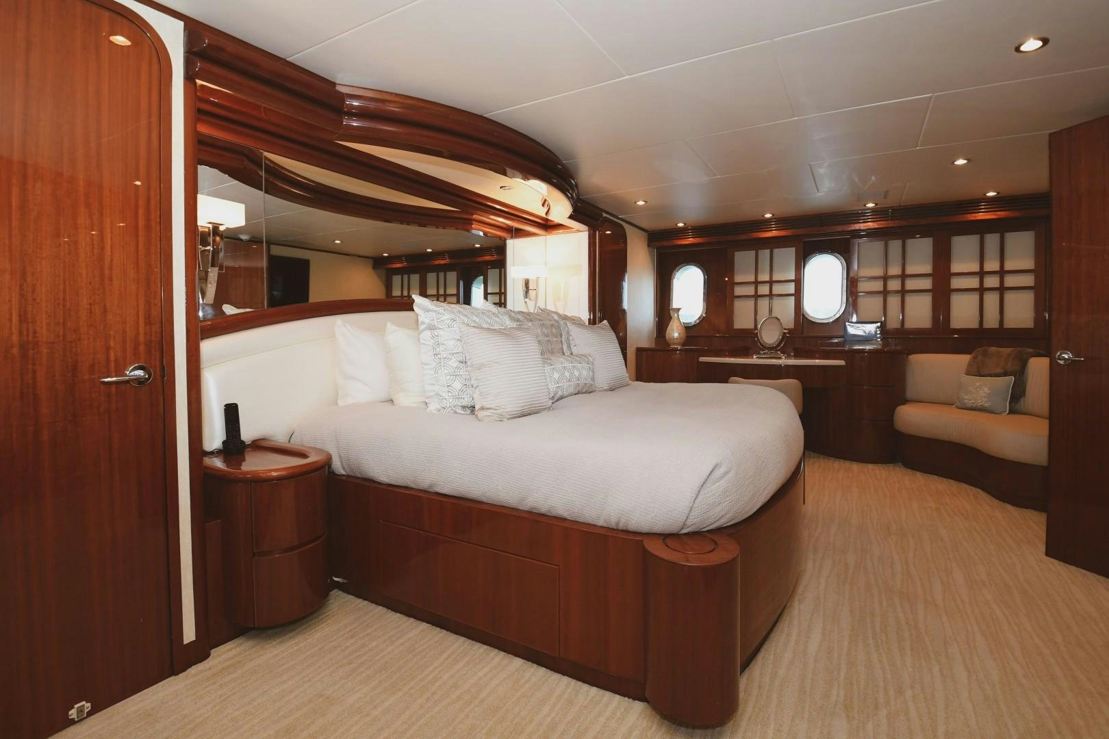 a large bed in a room aboard WARHORSE Yacht for Sale
