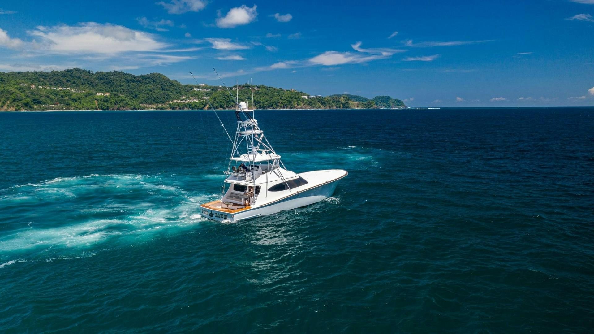 a boat in the water aboard Fish Tank Yacht for Sale
