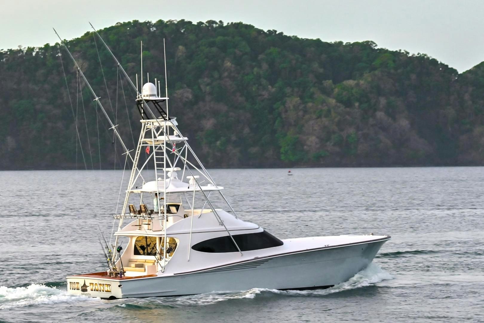 a boat on the water aboard Fish Tank Yacht for Sale