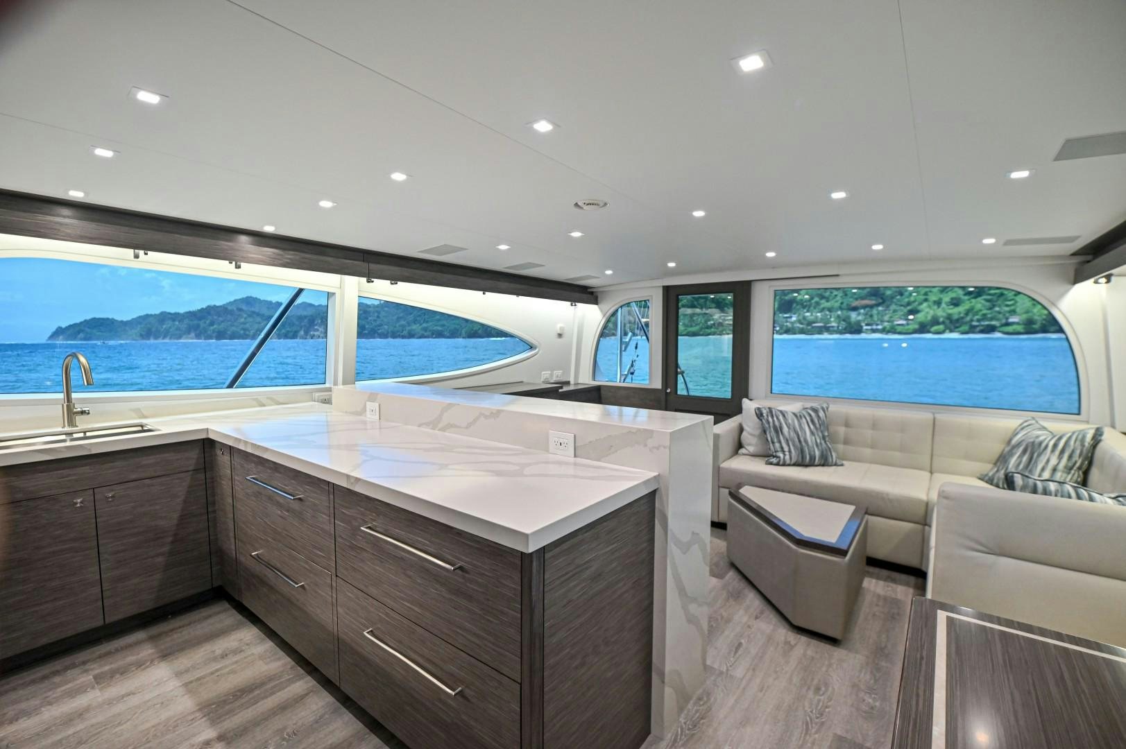 a kitchen with a view of the ocean aboard Fish Tank Yacht for Sale