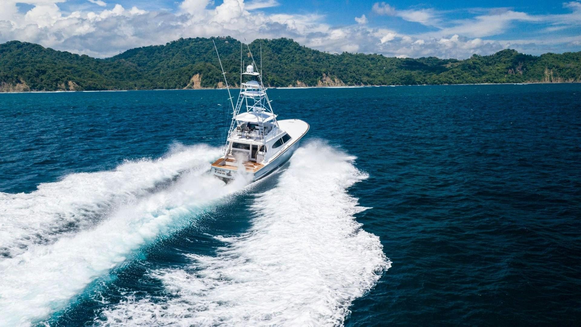 a boat on the water aboard Fish Tank Yacht for Sale