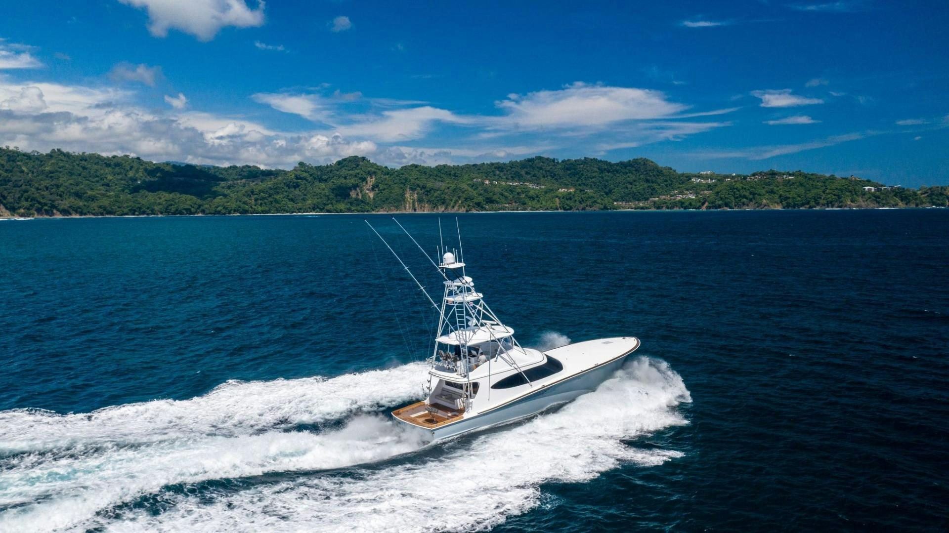 a boat on the water aboard Fish Tank Yacht for Sale