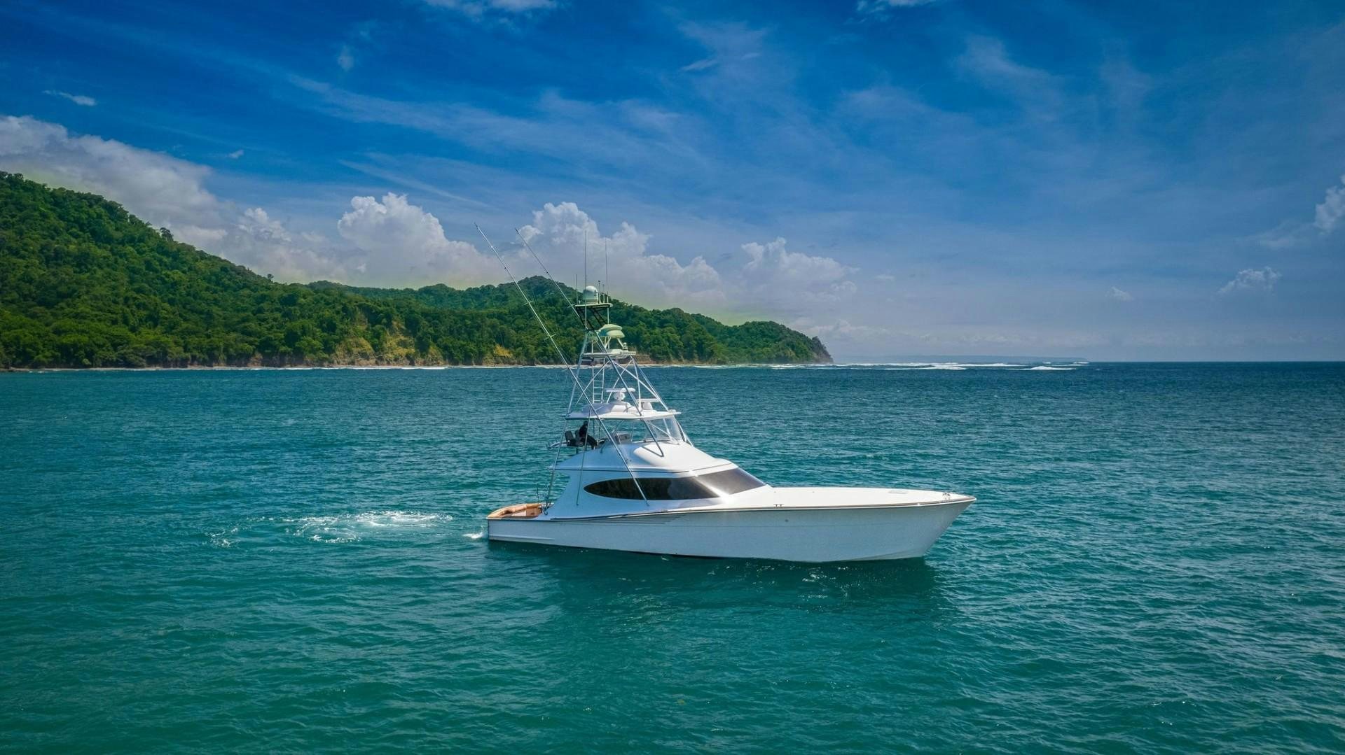 a boat in the water aboard Fish Tank Yacht for Sale