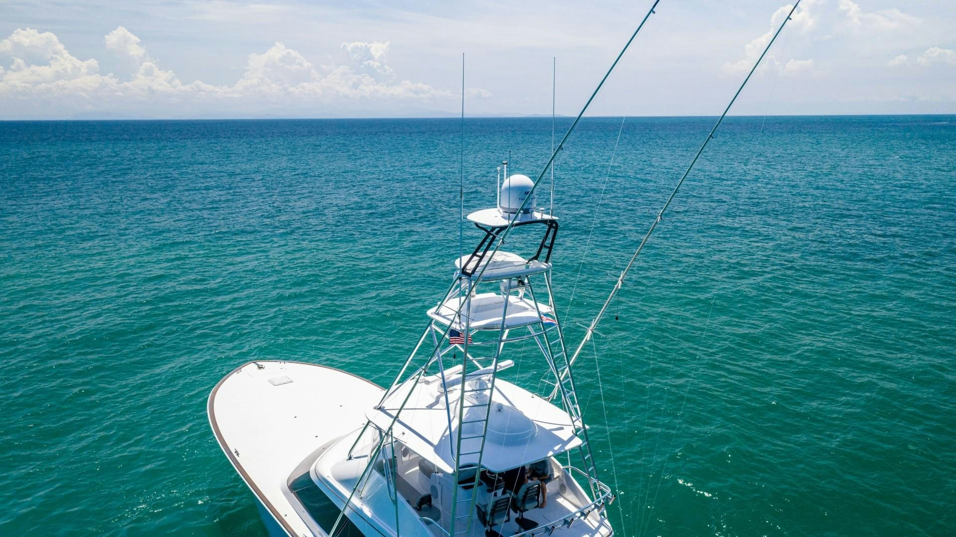 a boat in the water aboard Fish Tank Yacht for Sale