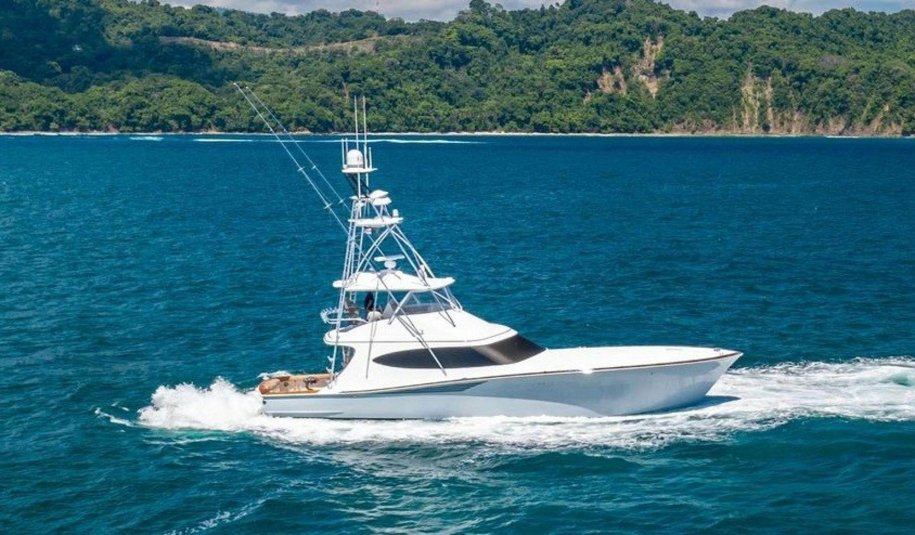 a boat on the water aboard Fish Tank Yacht for Sale