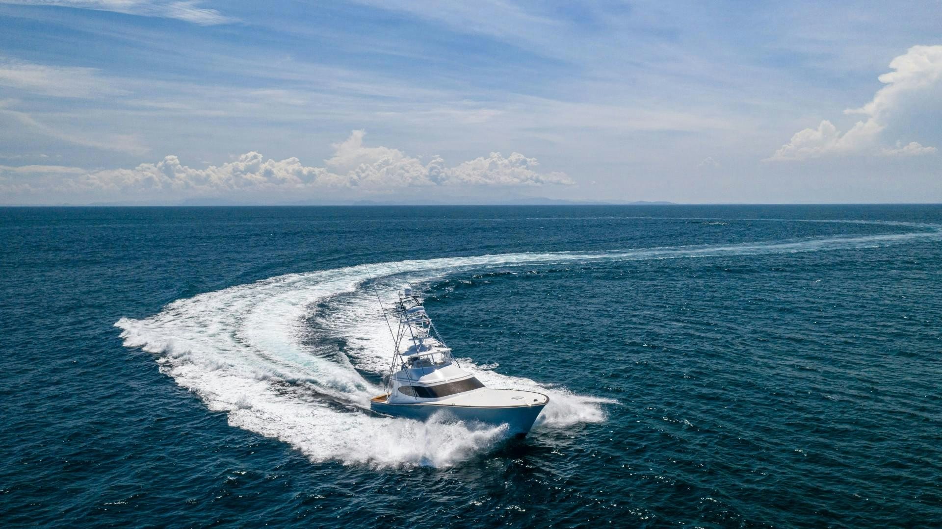 a boat on the water aboard Fish Tank Yacht for Sale