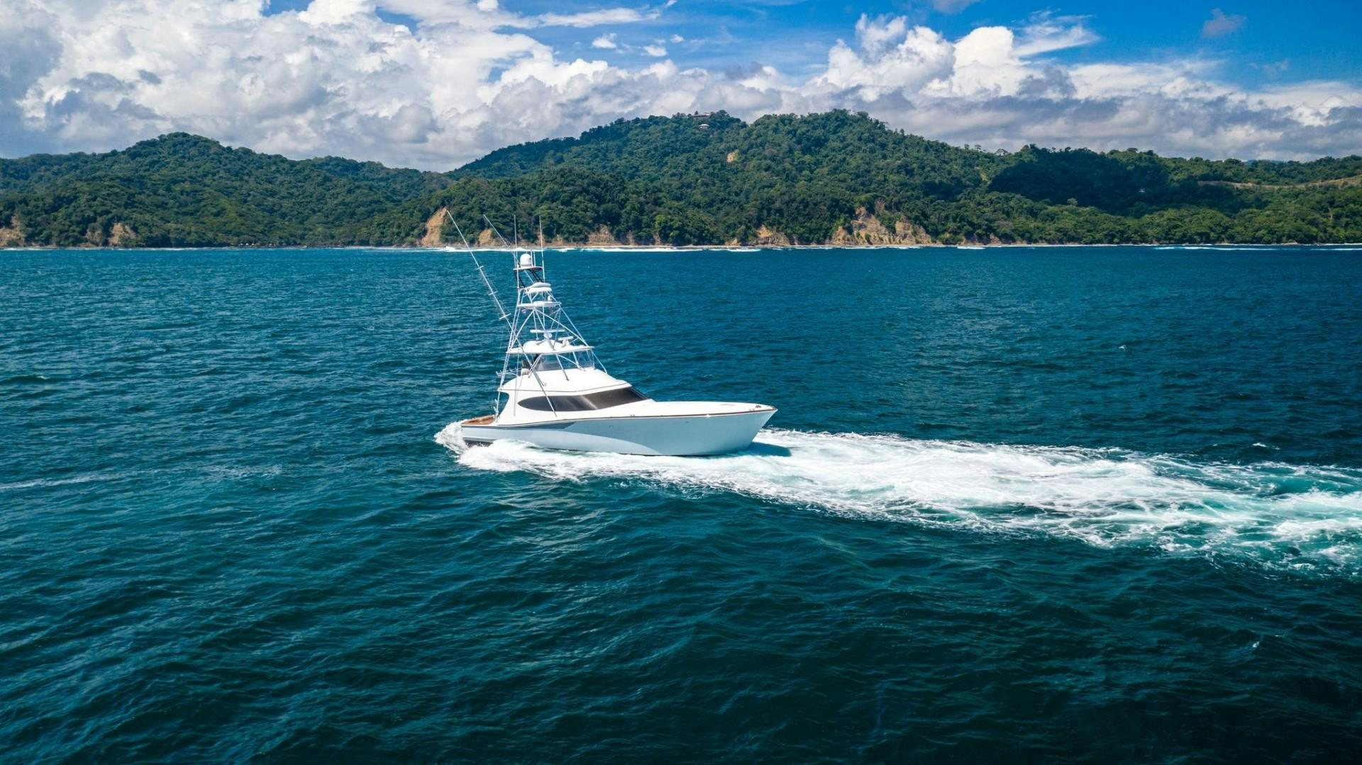 a boat on the water aboard Fish Tank Yacht for Sale