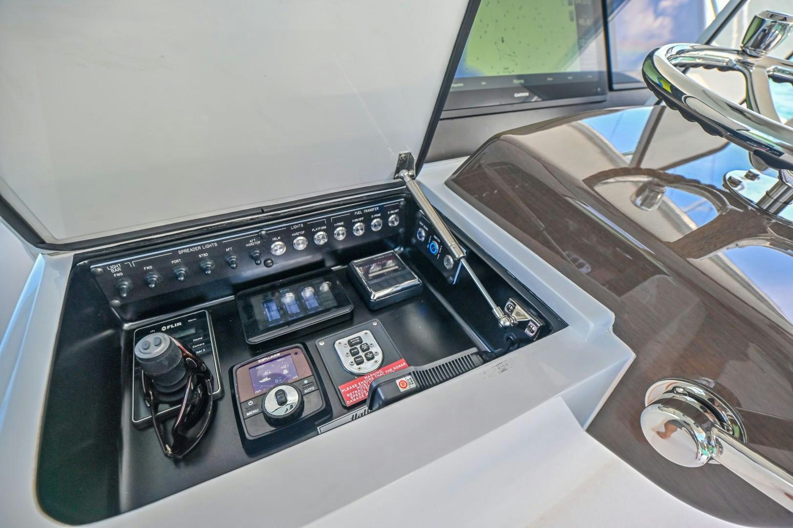 the inside of a car aboard Fish Tank Yacht for Sale