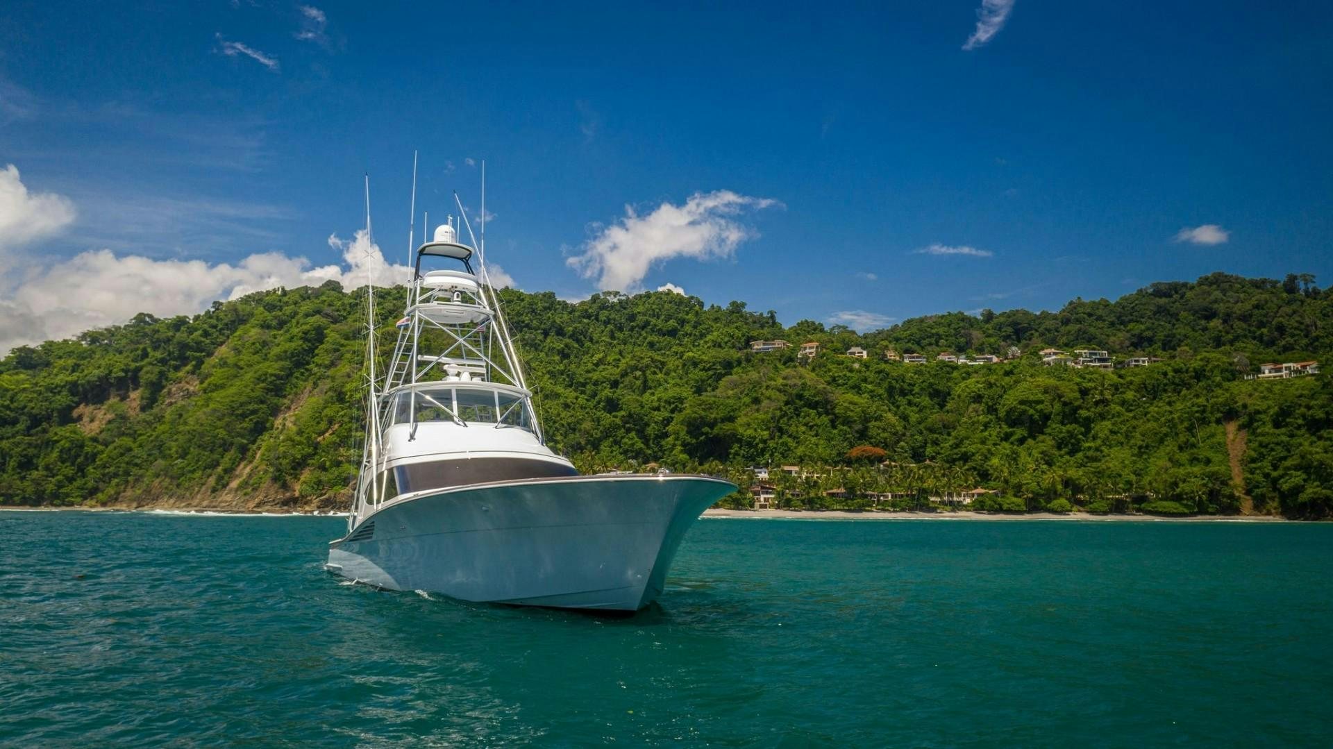 a boat on the water aboard Fish Tank Yacht for Sale