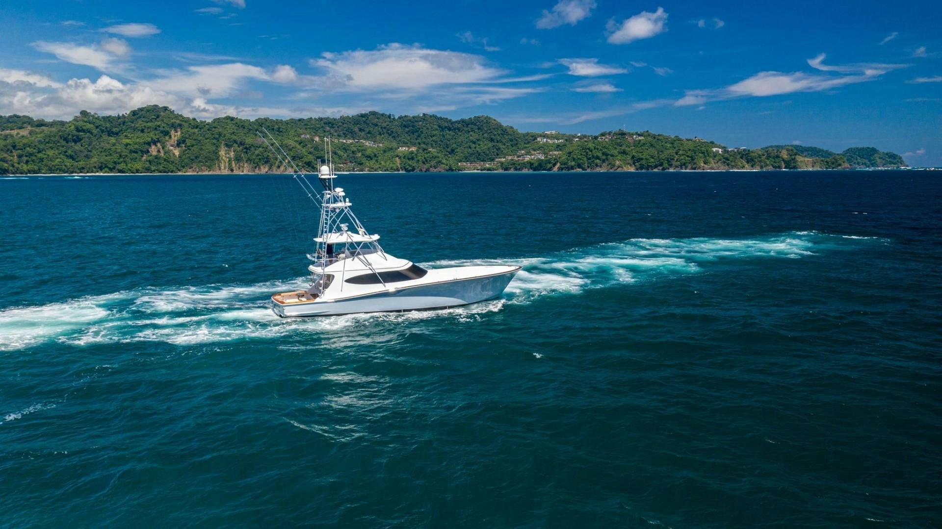 a boat on the water aboard Fish Tank Yacht for Sale