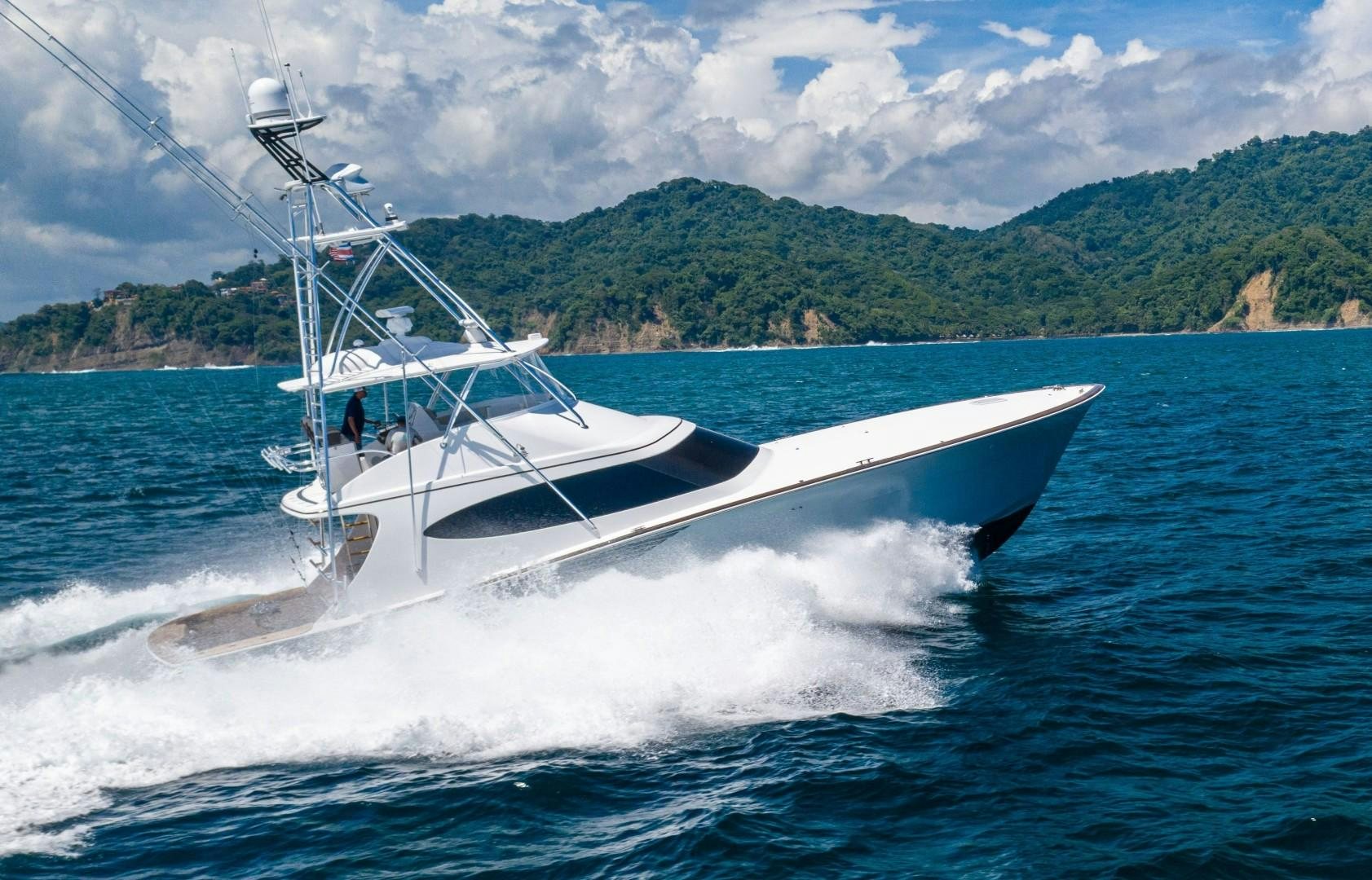 a boat on the water aboard Fish Tank Yacht for Sale
