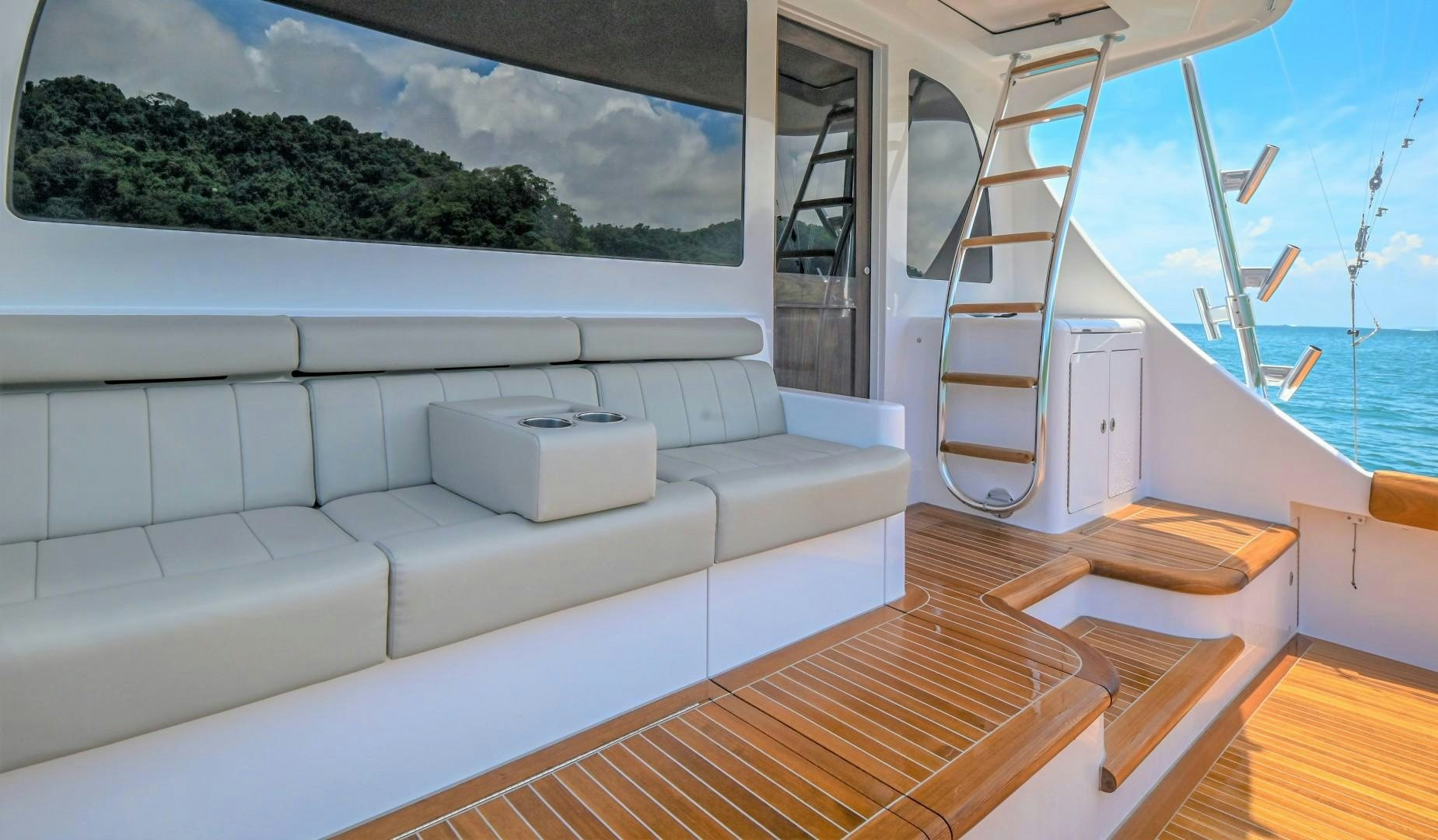 a boat on the water aboard Fish Tank Yacht for Sale
