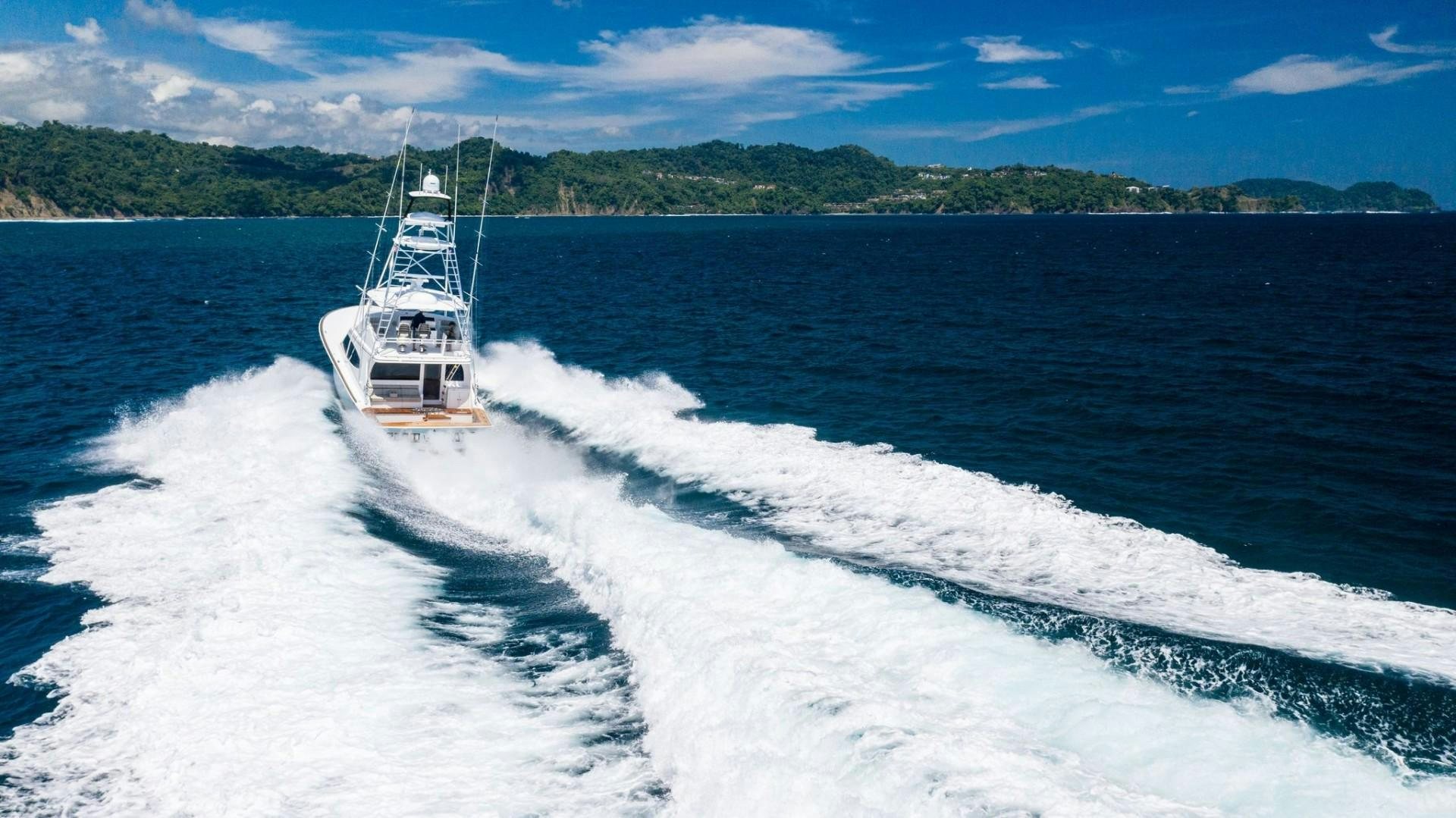 a boat on the water aboard Fish Tank Yacht for Sale