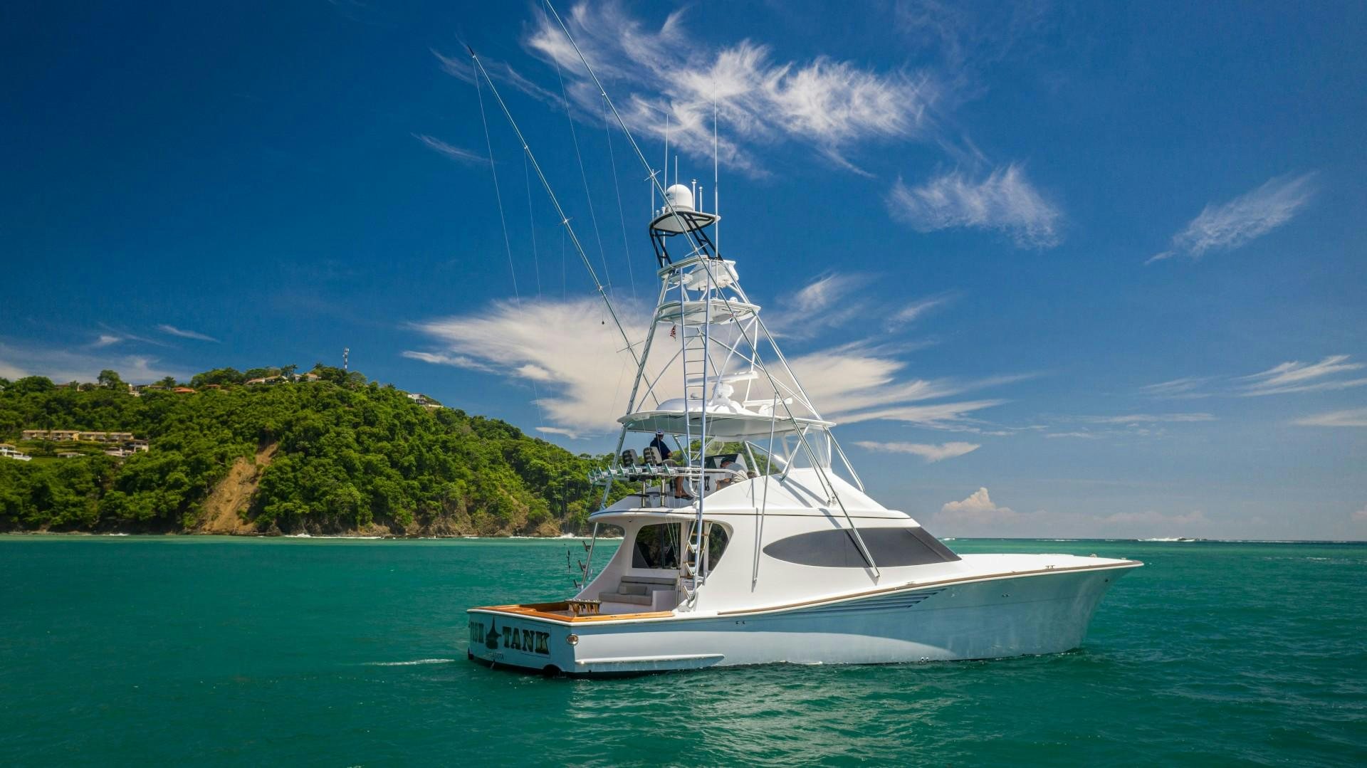 a boat in the water aboard Fish Tank Yacht for Sale