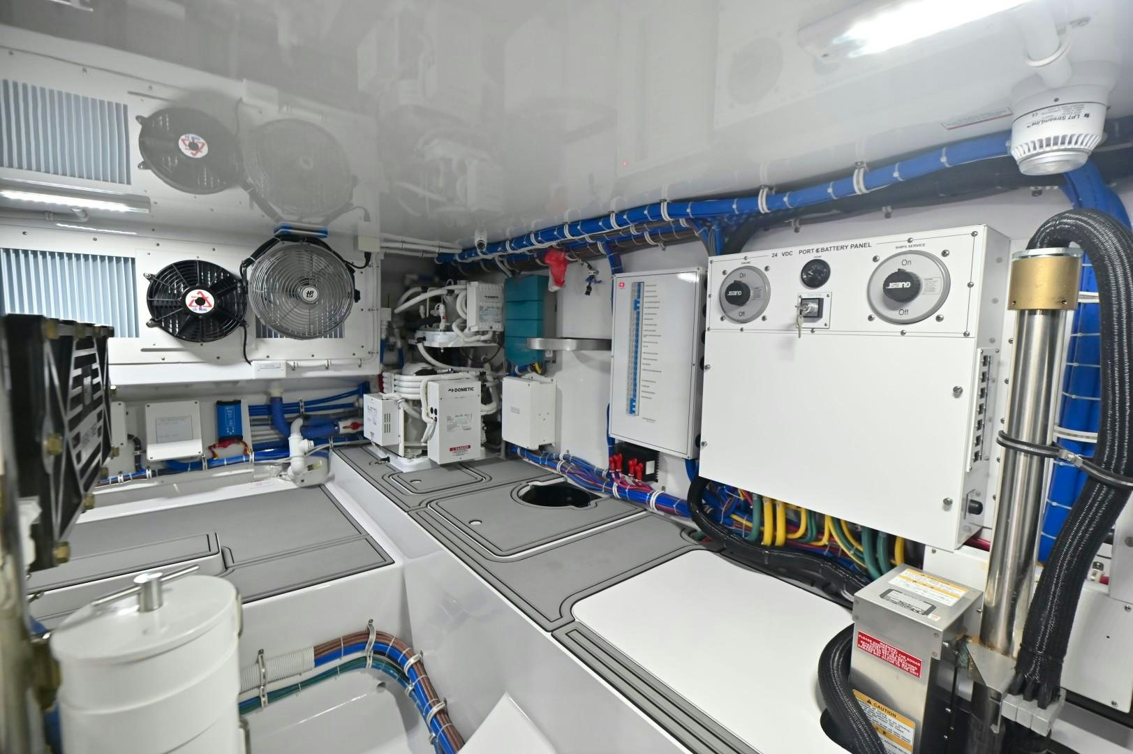 a room with several machines aboard Fish Tank Yacht for Sale
