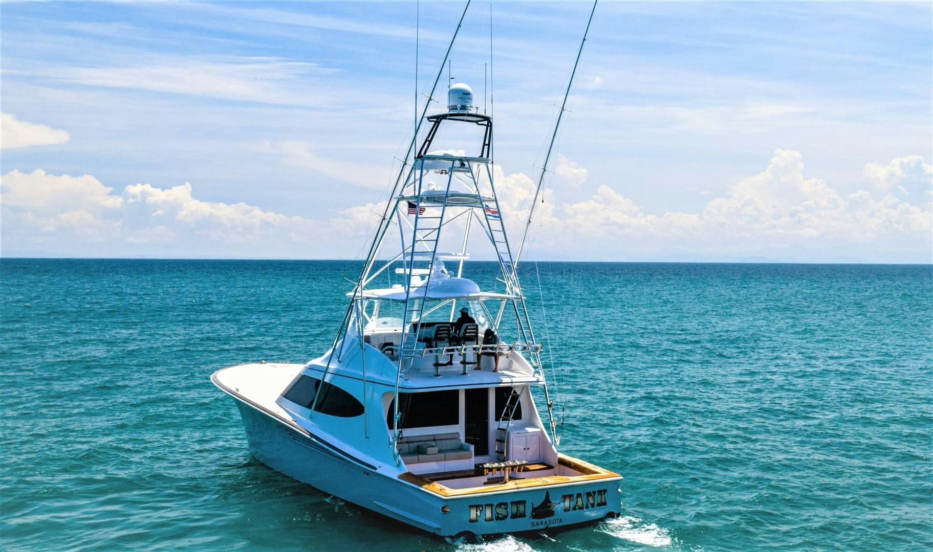 a boat in the water aboard Fish Tank Yacht for Sale