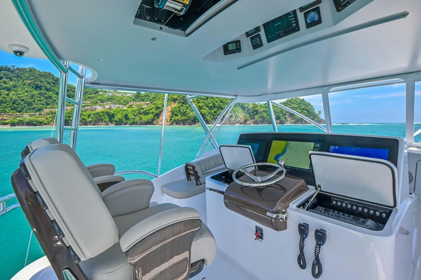 a boat with a sink and a printer on it aboard Fish Tank Yacht for Sale