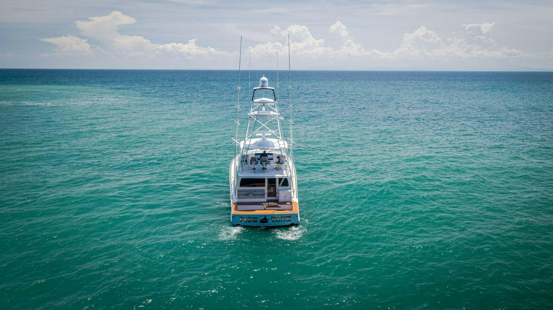 a boat on the water aboard Fish Tank Yacht for Sale