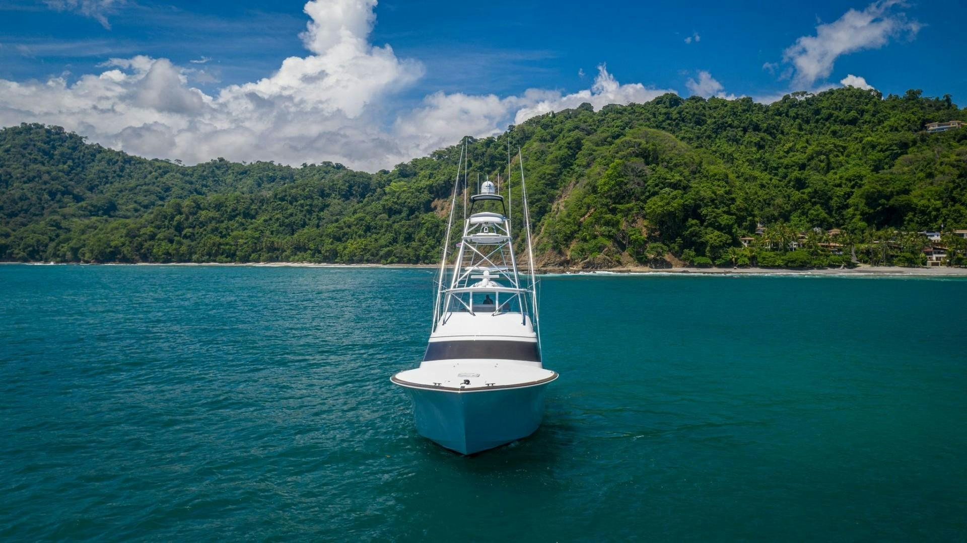 a boat on the water aboard Fish Tank Yacht for Sale