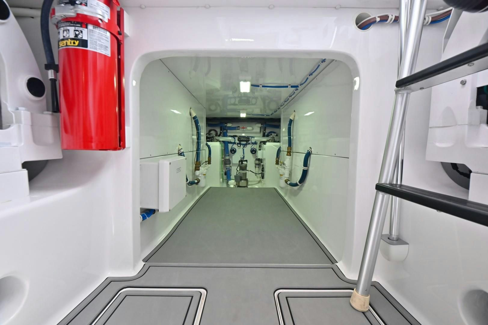 a hallway with a few people aboard Fish Tank Yacht for Sale