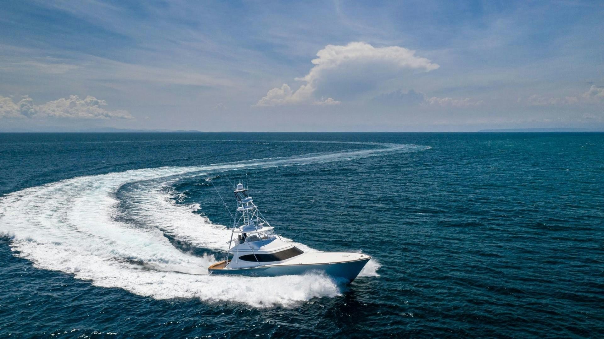 a boat on the water aboard Fish Tank Yacht for Sale