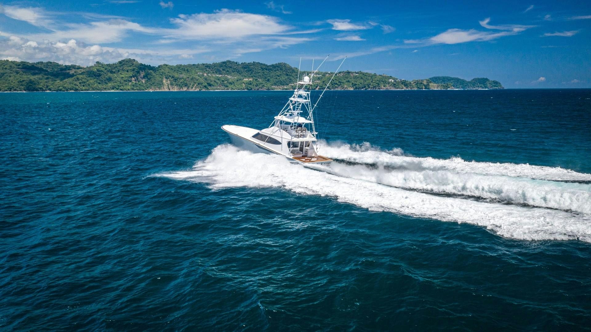 a boat on the water aboard Fish Tank Yacht for Sale