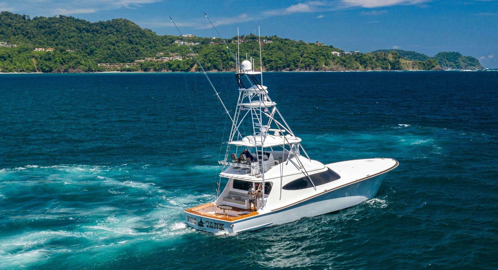 a boat on the water aboard Fish Tank Yacht for Sale