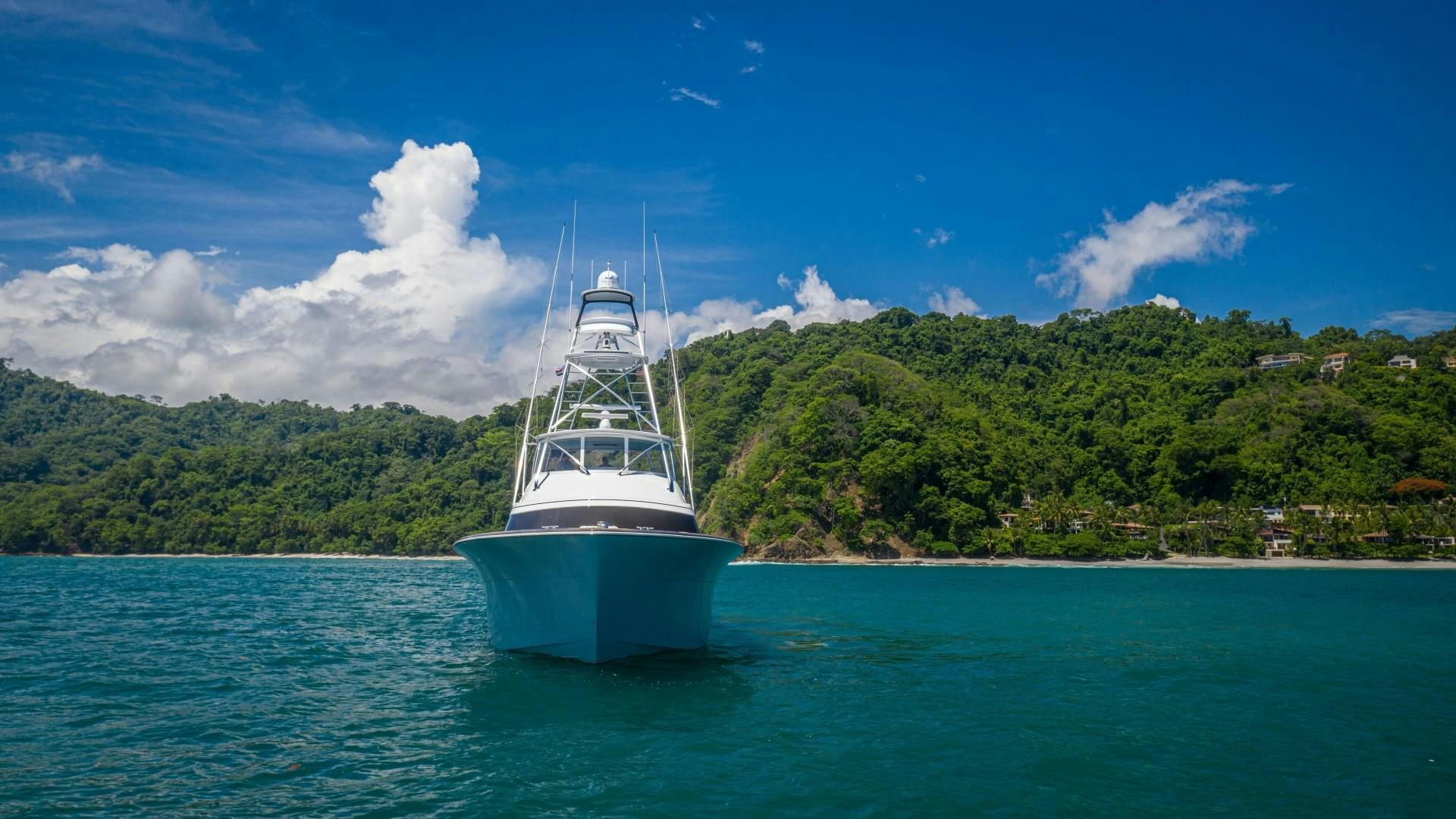 a boat in the water aboard Fish Tank Yacht for Sale
