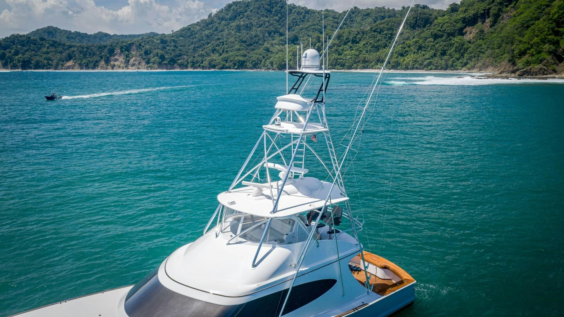 a boat on the water aboard Fish Tank Yacht for Sale