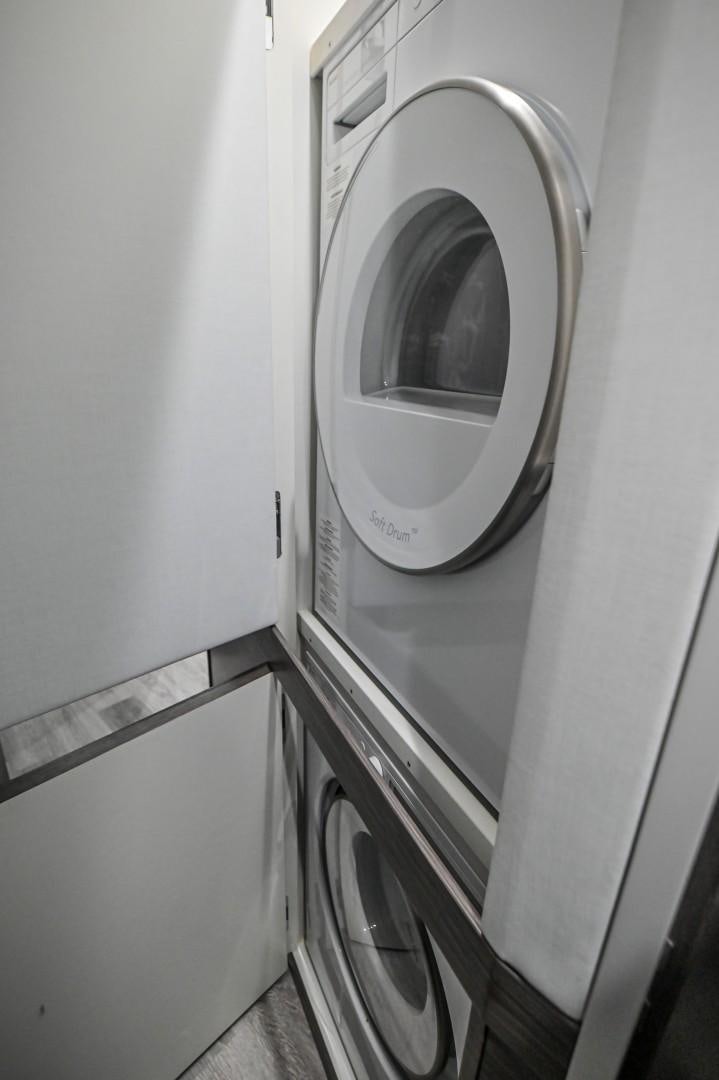 a white washing machine aboard Fish Tank Yacht for Sale