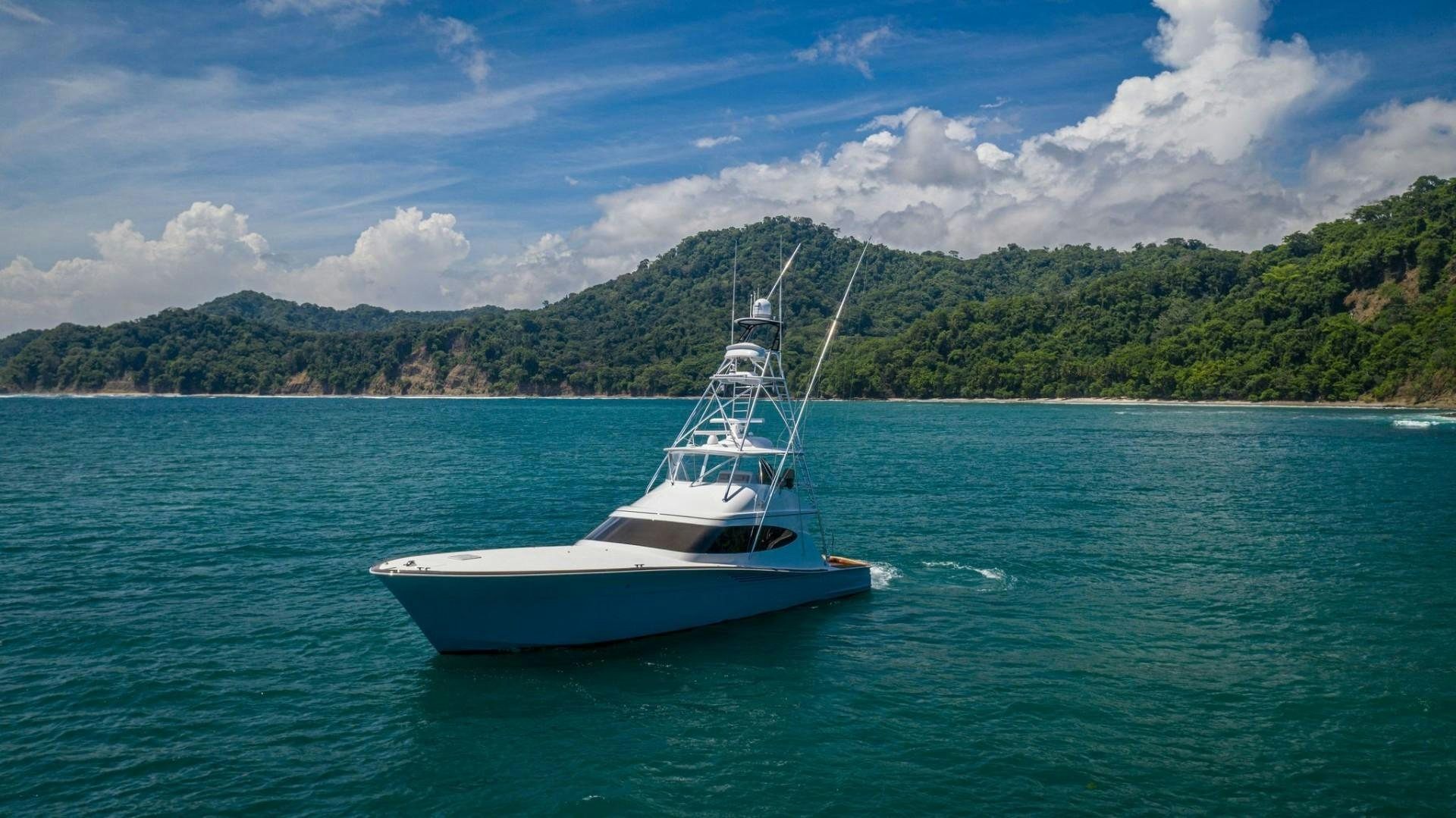 a boat in the water aboard Fish Tank Yacht for Sale
