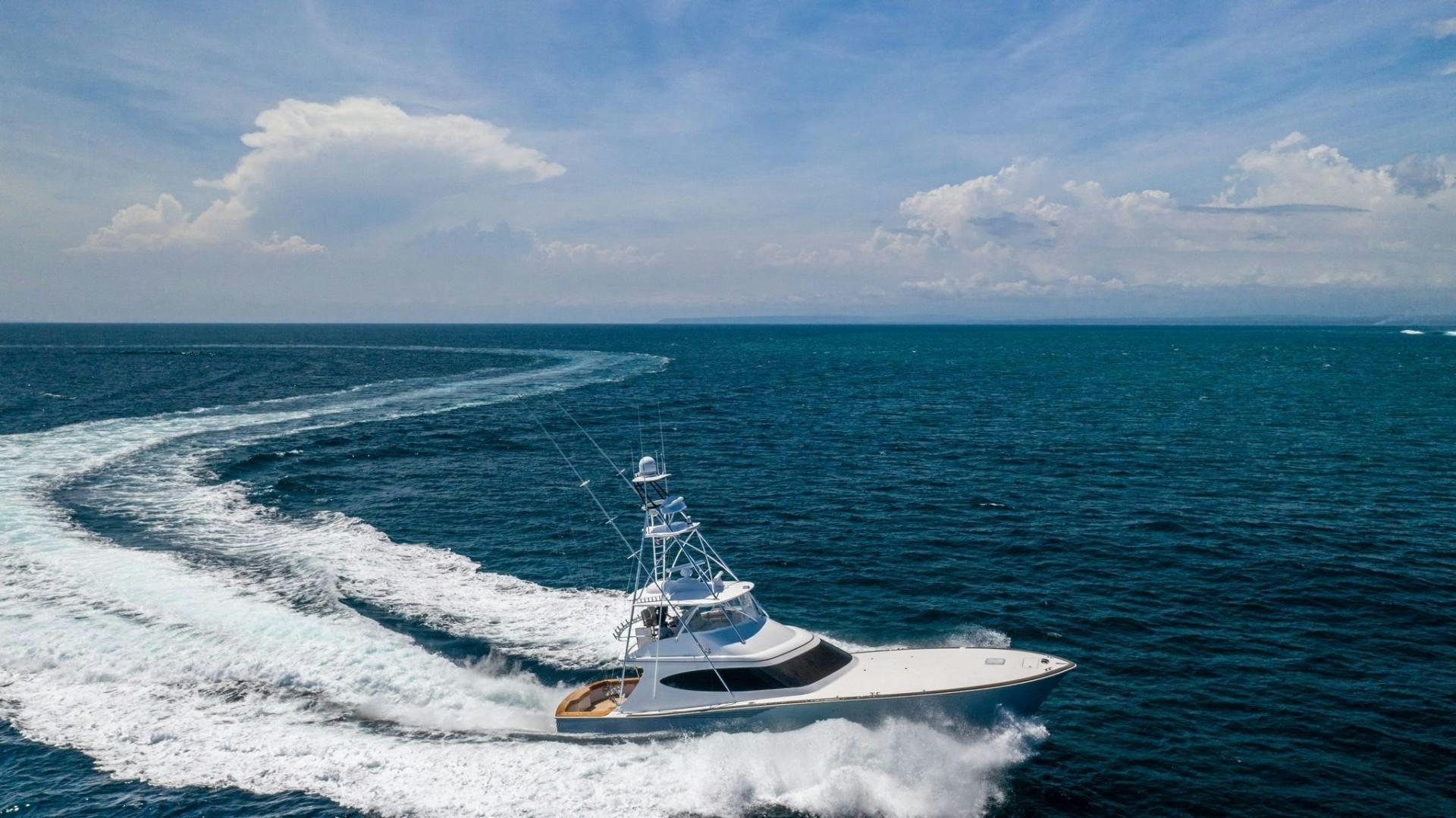a boat on the water aboard Fish Tank Yacht for Sale
