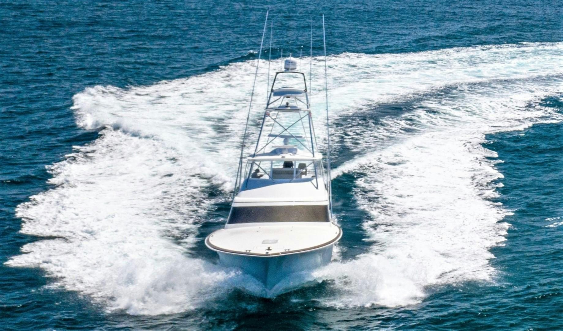 a boat on the water aboard Fish Tank Yacht for Sale