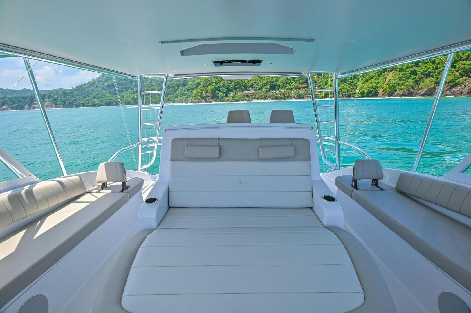 a boat on the water aboard Fish Tank Yacht for Sale