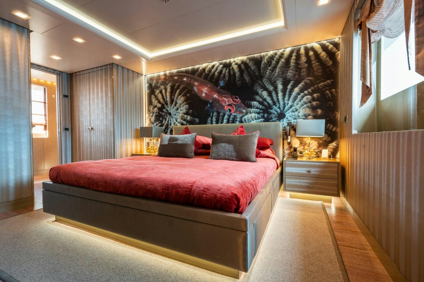 a bed in a room aboard LIBERTY Yacht for Sale