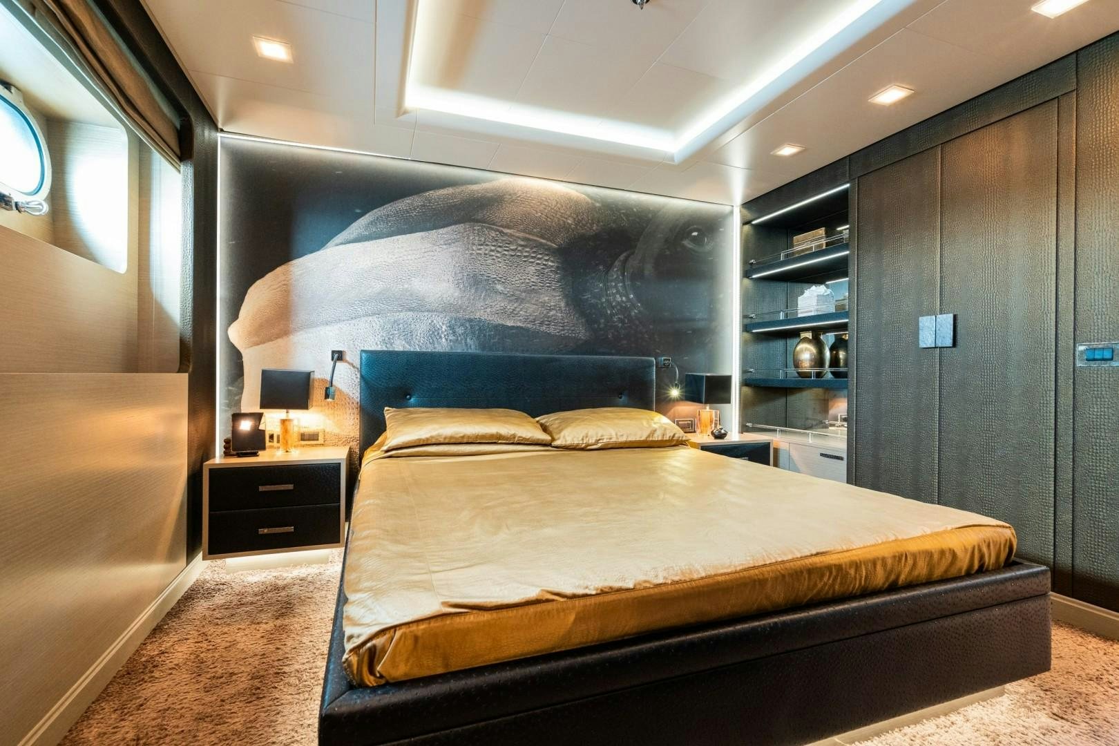 a bed in a room aboard LIBERTY Yacht for Sale