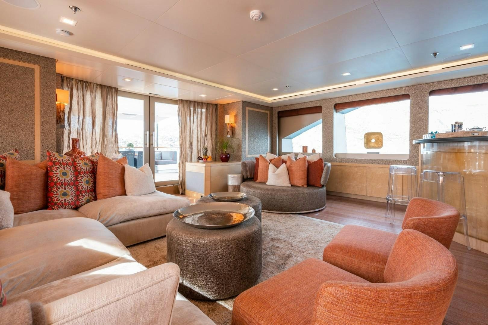 a living room with a couch and a coffee table aboard LIBERTY Yacht for Sale