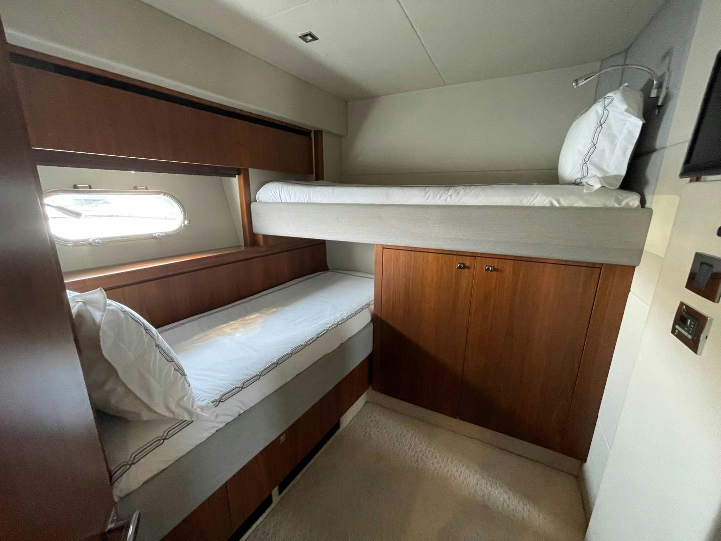 a room with two beds aboard TRAINERA Yacht for Sale