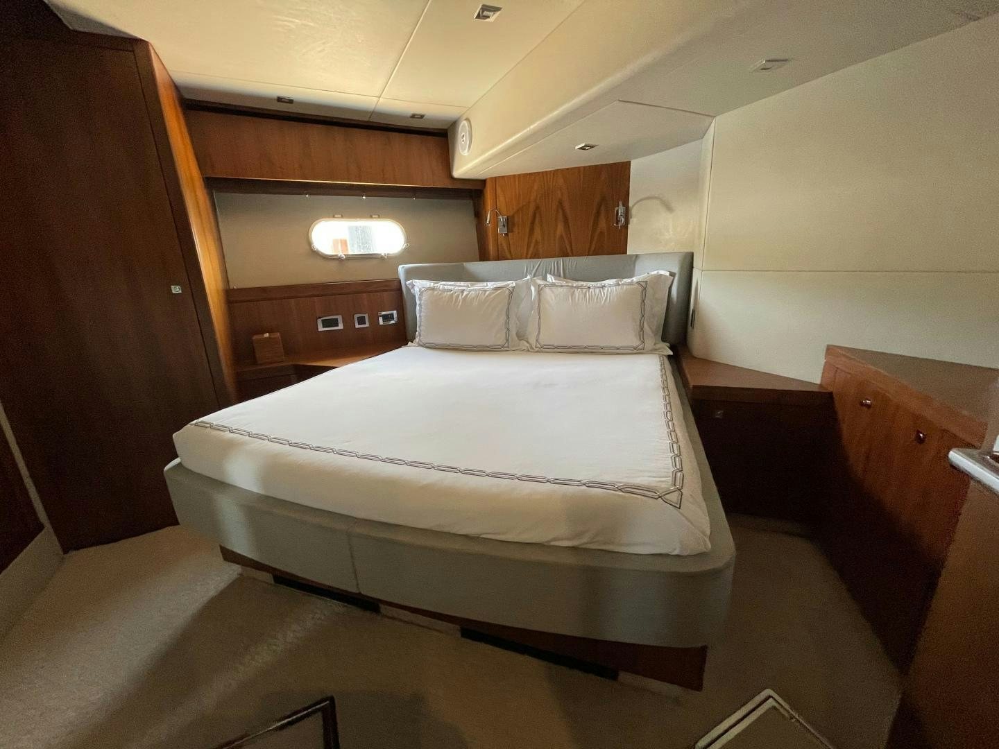 a bed in a room aboard TRAINERA Yacht for Sale