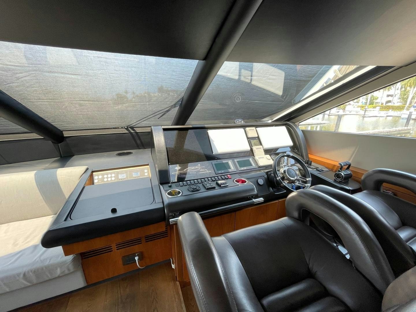 a vehicle with a desk and a computer on it aboard TRAINERA Yacht for Sale