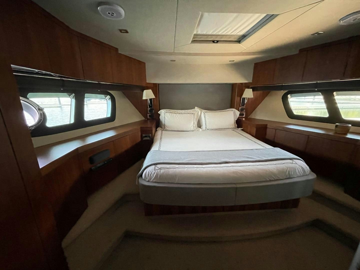 a bed in a room aboard TRAINERA Yacht for Sale